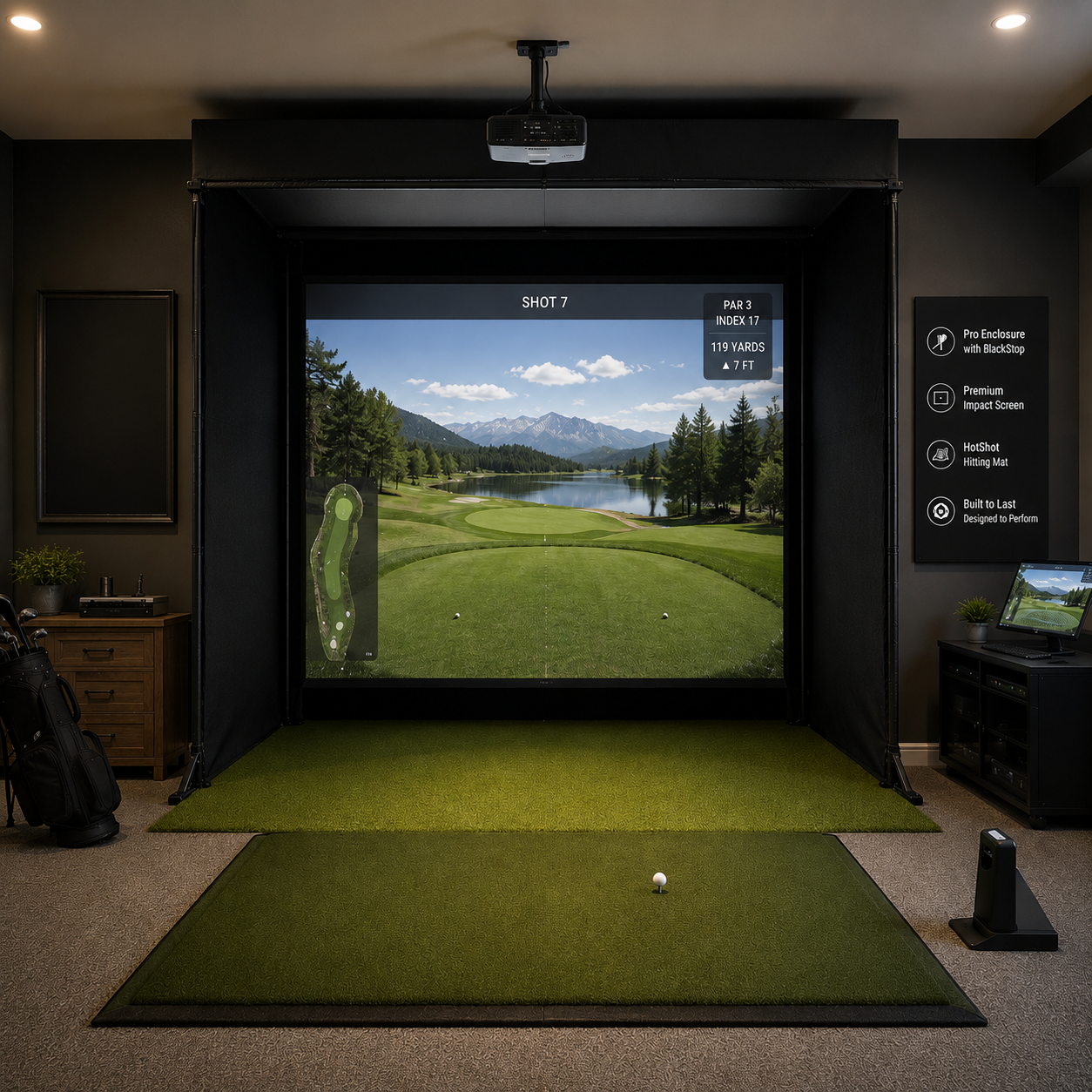 Pro golf simulator enclosure with BlackStop fabric, floor-to-turf Premium impact screen, and HotShot hitting mat in a dedicated home golf studio room