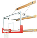 Bison 6 to 8 foot stationary wall-mounted basketball package shown fully extended in school gymnasium