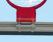 Bison glass backboard stabilizer bar close-up showing integrated support strut that absorbs rim impact