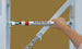 Bison T-REX International portable basketball system backboard tension cable structure close-up