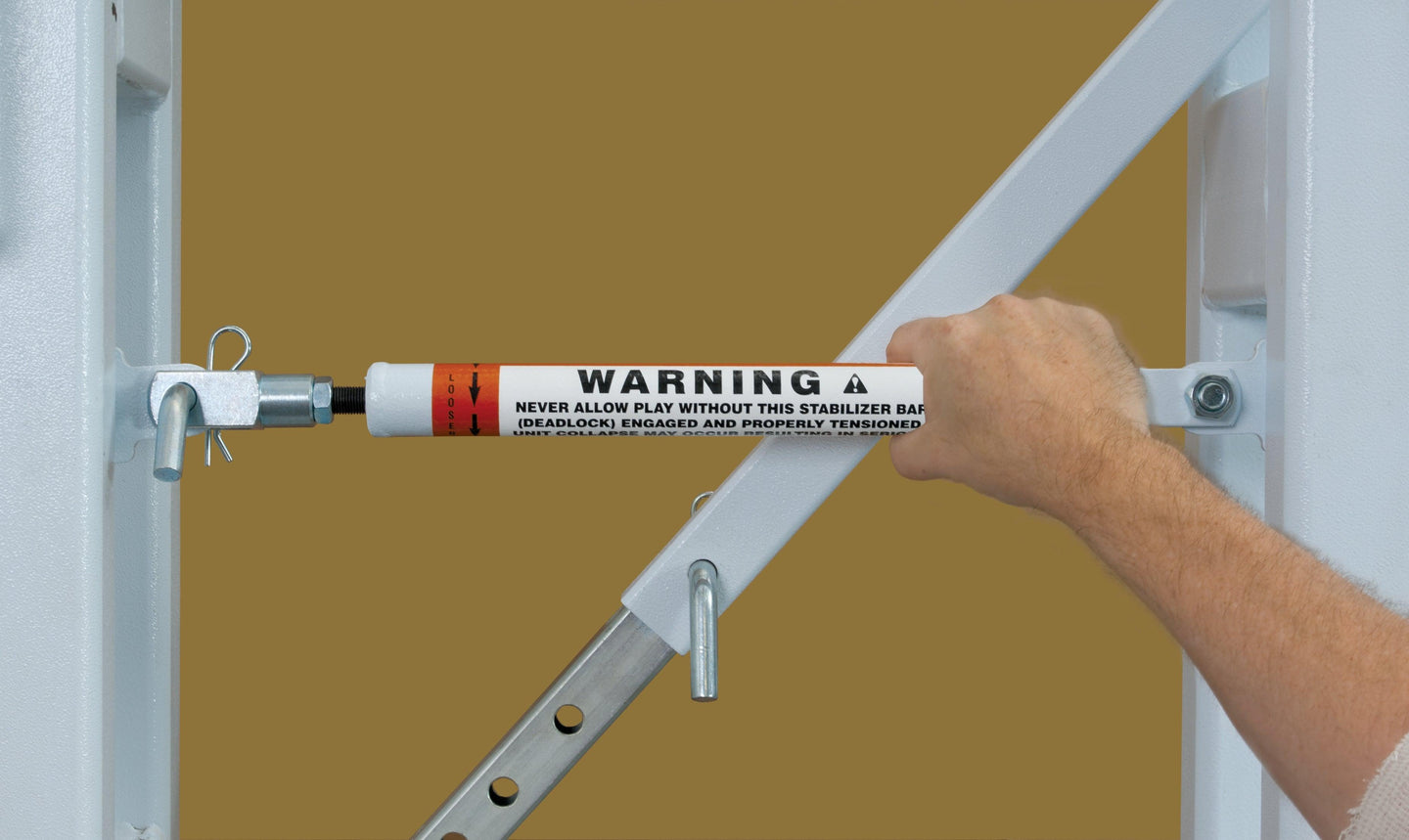 Bison T-REX Competition basketball system backboard tension cable close-up showing support wires